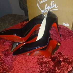 Christian Louboutin Glossy Black Heels with Iconic Red Soles